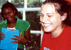 Students laughing about a shared experience with a math problem.