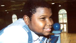 Student enjoying watching other students perform.